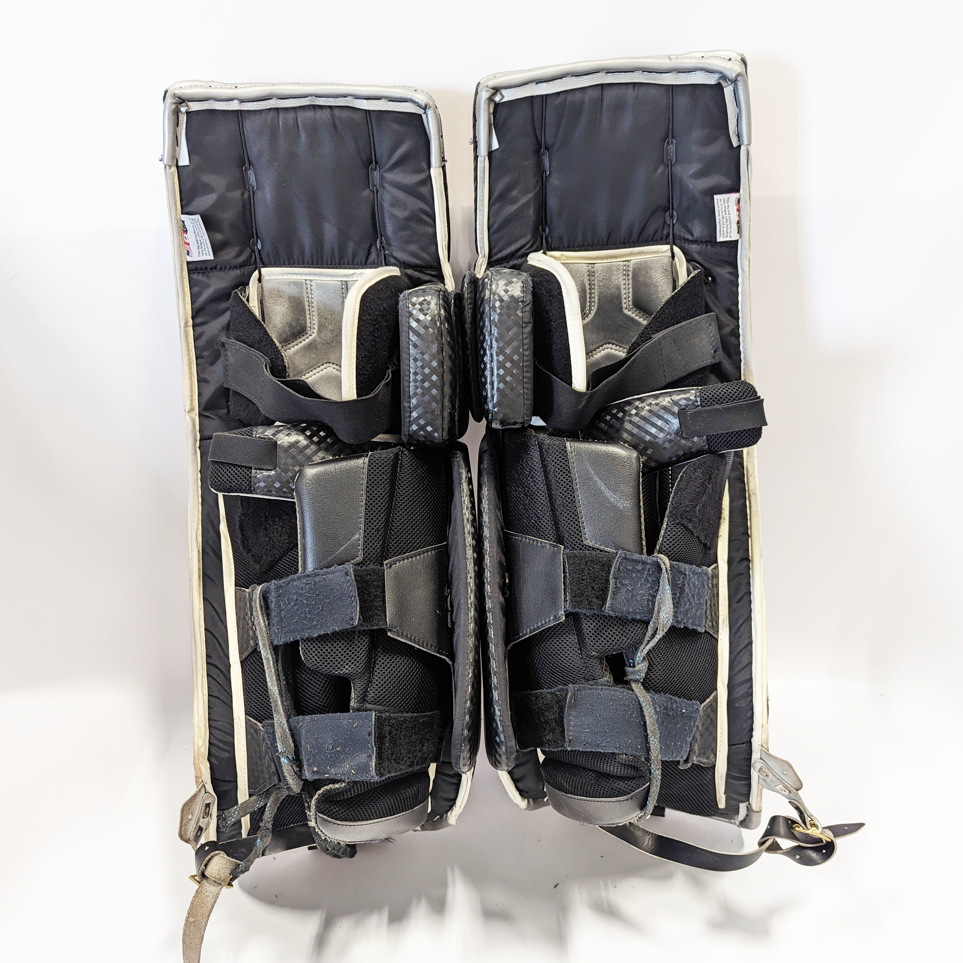 Vaughn Velocity VE8 - Used NCAA Pro Stock Goalie Pads (Black/Orange/Grey)