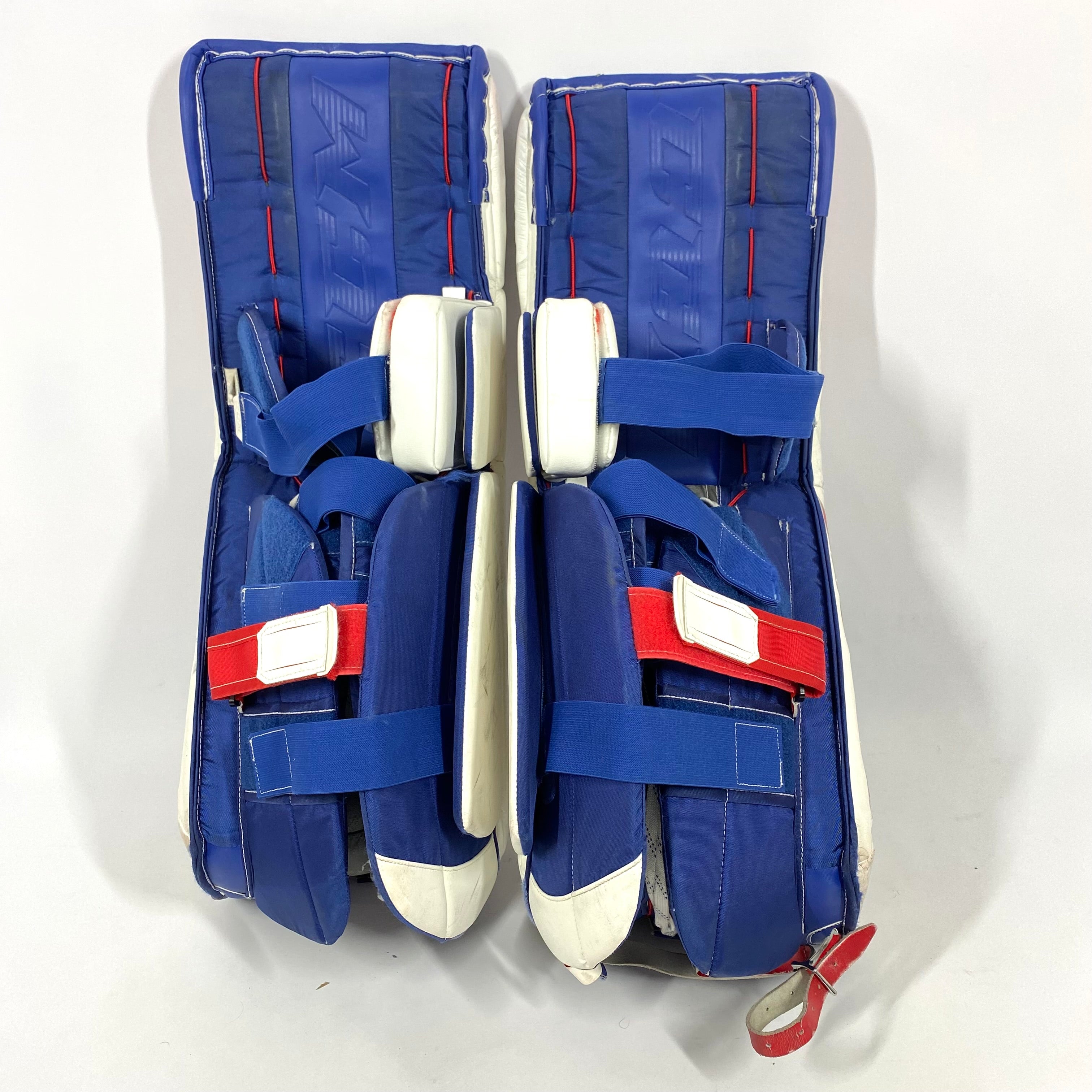 Extreme Flex 5 - Used Pro Stock Goalie Pads (White/Blue/Red)