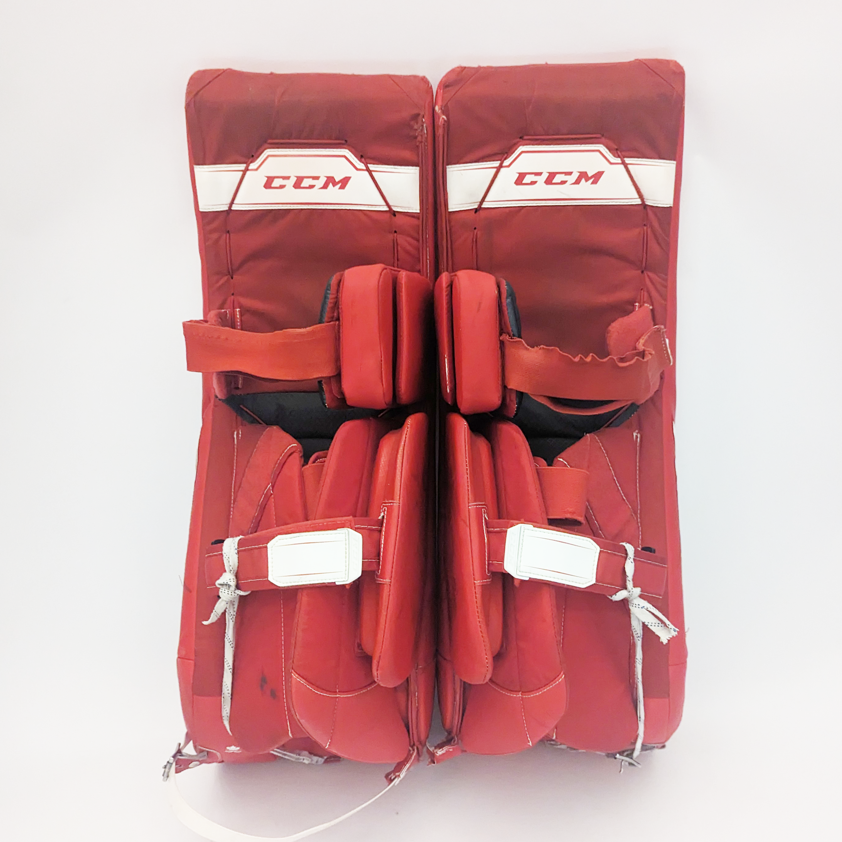 CCM AXIS - Jambières de gardien de but Pro Stock d'occasion (rouge/blanc)