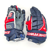 Gant de hockey junior Sherwood Code TMP Pro (bleu marine/rouge/blanc)