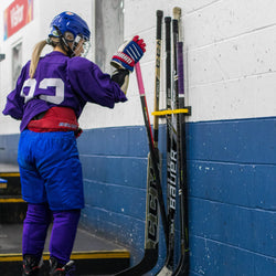 Stick Check - Support pour bâtons de hockey